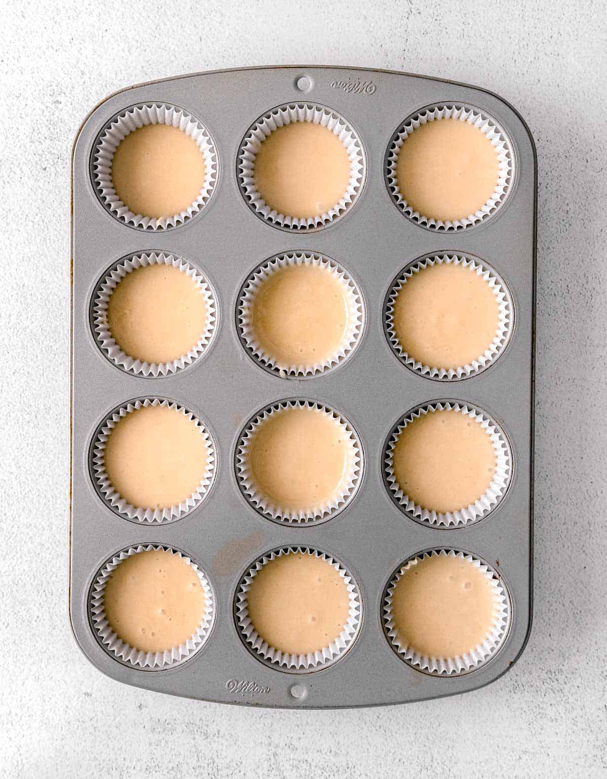 batter in a 12 cup muffin tin