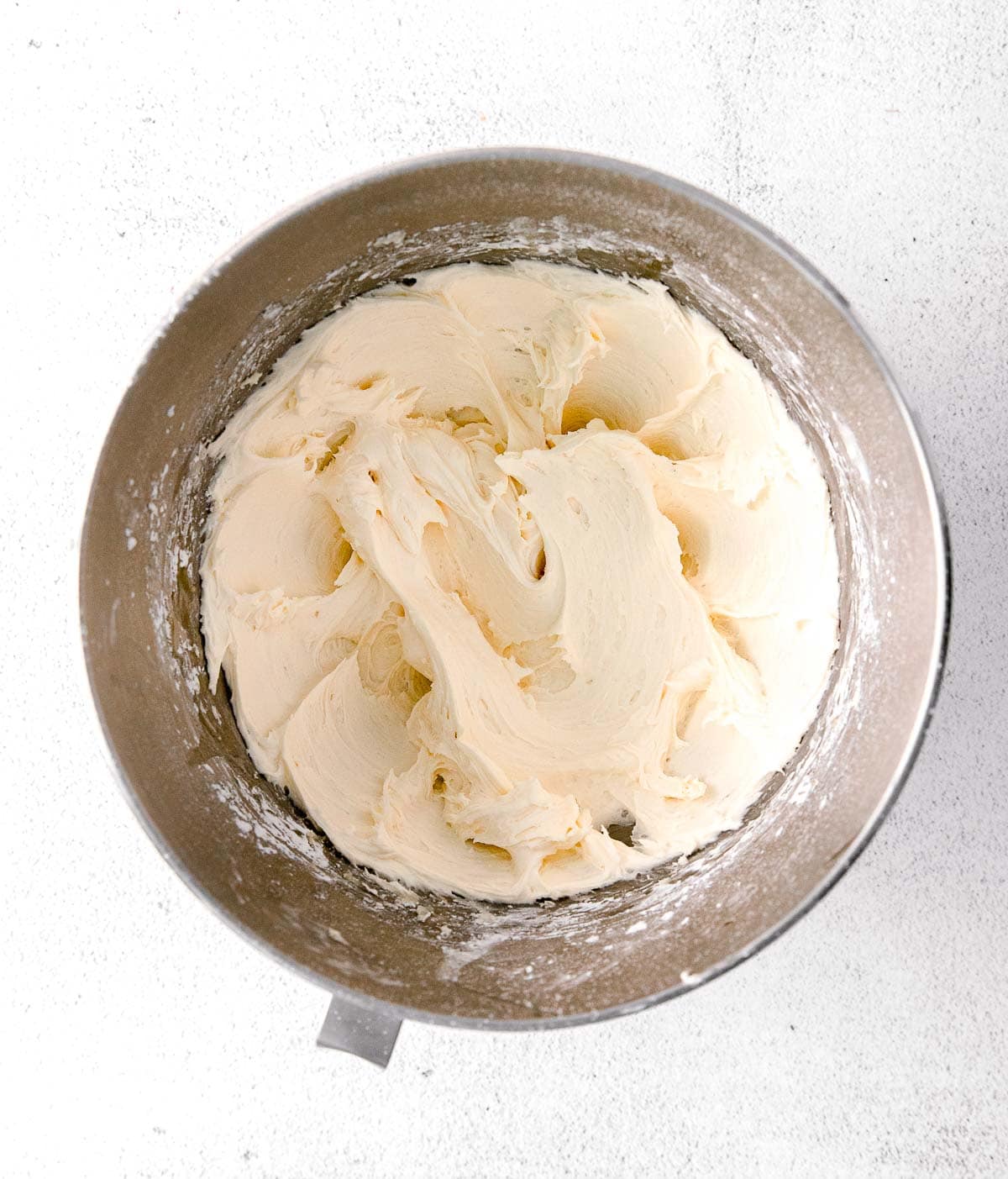 buttercream in a metal stand mixer bowl