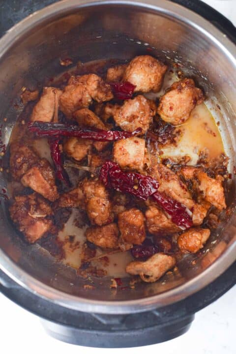 chicken tossed in general tso sauce in the instant pot