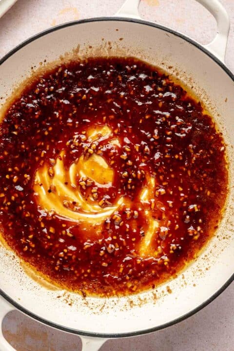 thickened general tso's sauce in a cast iron skillet
