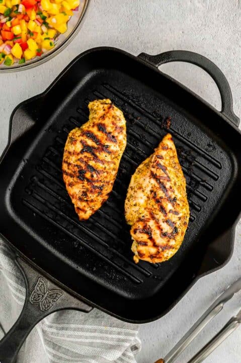 grilled mojo chicken in a cast iron grill