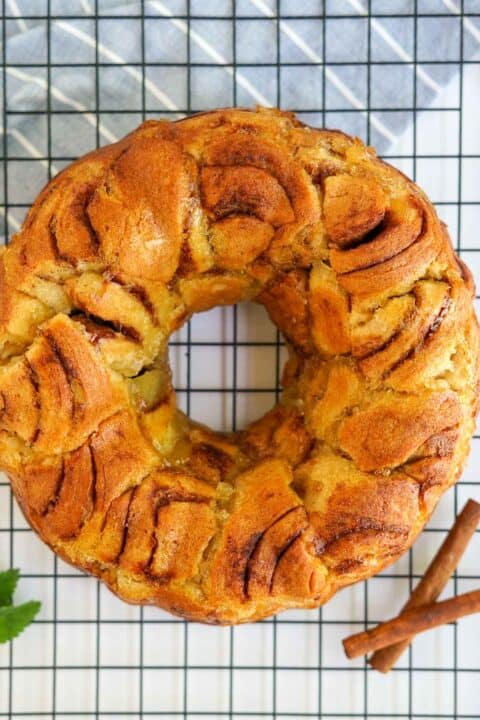 baked apple monkey bread cooling on a wired baking rack